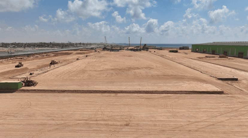 Laying the Foundations Behind the Building Site